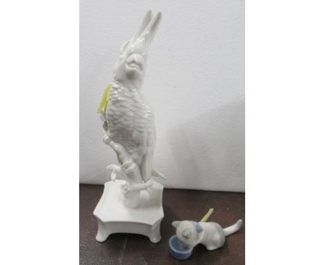 A white model, of a cockatoo, height 7ins&nbsp; together with a Wade model of a cat drinking from a bowl