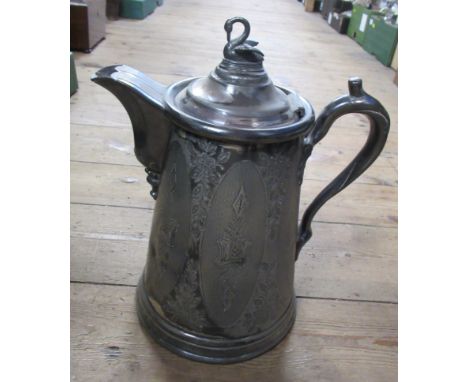 A silver plated water pitcher
