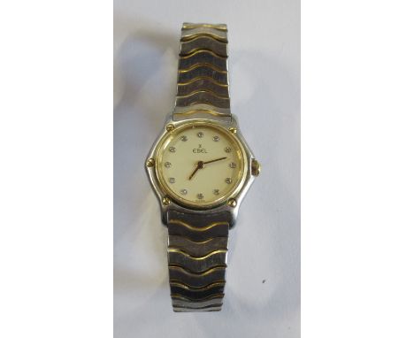 A ladies Ebel stainless steel dress watch, the champagne dial set with twelve diamond markers, 1057901 18105089&nbsp;