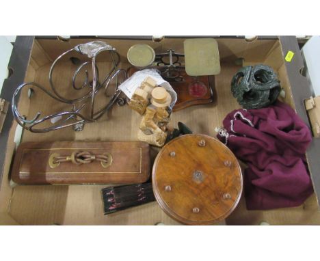 A box of assorted items, to include a cotton reel holder, a carved wooden figure, a set of postal scales etc