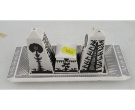 A Royal Worcester Scottie Wilson three piece cruet and stand, decorated in black and grey