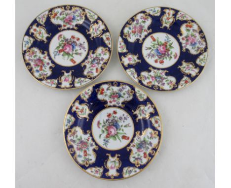 From the collection of Lord &amp; Lady Flight, Three Flight, Barr &amp; Barr blue scale plates, decorated with flowers, (Flig
