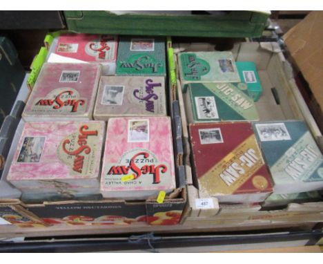 Two boxes of vintage jigsaws, including Chad Valley