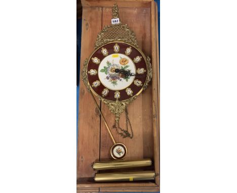 Brass and enamel floral design wall clock with pendulum and weights, 11” w x 20” h