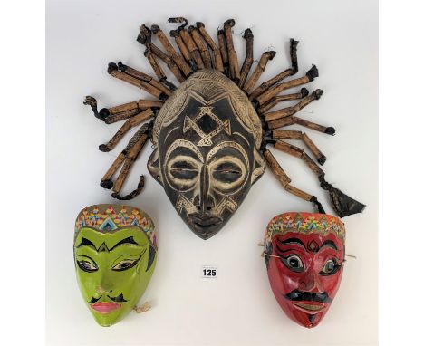Wooden carved tribal witch doctor mask and 2 painted face masks
