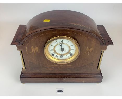 Inlaid mahogany 2-hole mantle clock with brass pillars and pendulum, 14” w x 12”h
