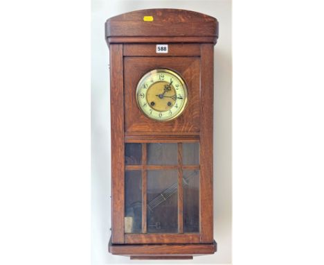 Oak 2-hole wall clock with pendulum and key, 28” long