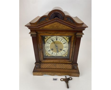 Walnut 2-hole mantle clock marked ‘Deutsch Patent 62975’ with pendulum and key, 11”w x 7”d x 15”h