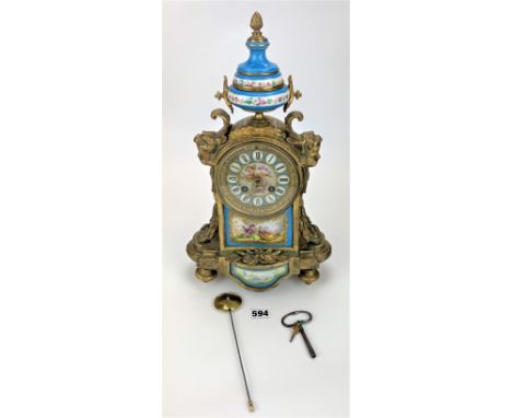 French ormolu and porcelain 2-hole mantle clock by Pierre Le Masson, Paris no. 985  with pendulum and key, 16”high
