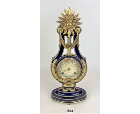 Franklin Mint Marie-Antoinette blue gilt and enamel mantle clock with key and instructions, 15” high. Running