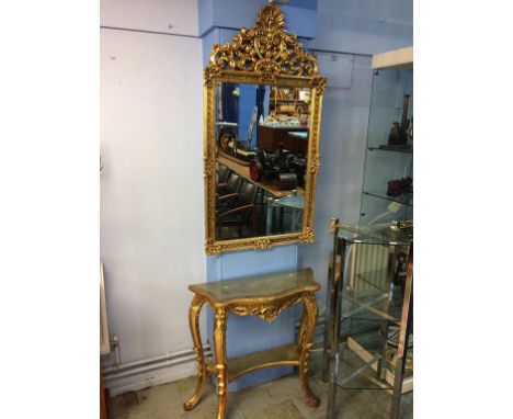 A gilt console table and over mirror