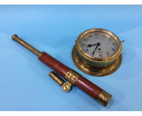 A Bulkhead clock and a telescope