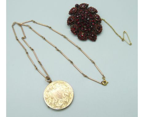 A 19th Century Bohemian garnet cluster brooch, glass portrait/memorial compartment verso, 4.5cm, together with a 9ct gold bac