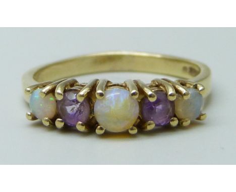 A 9ct gold, opal and amethyst ring, 2.4g, N