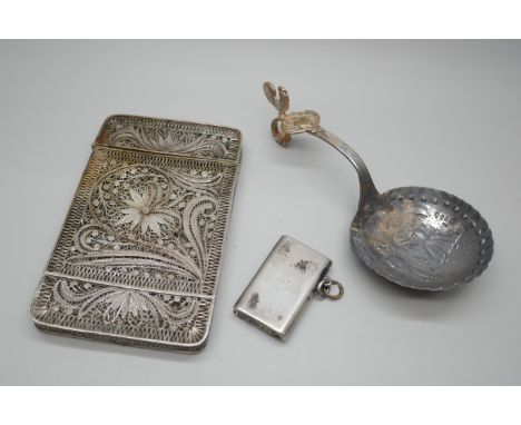 A white metal filigree card case, 10cm, a Dutch silver ladle and a silver vesta, 92g total
