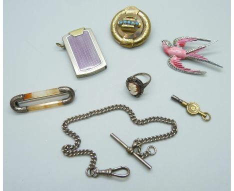 A collection of items including an Art Deco enamelled lighter/striker, a brooch in the form of a bird, a Victorian turquoise 