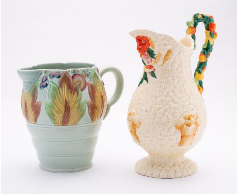 Two Clarice Cliff jugs comprising a Celtic Harvest and a Celtic Leaf and Berry jug, printed Newport marks, circa 1938, 28 and