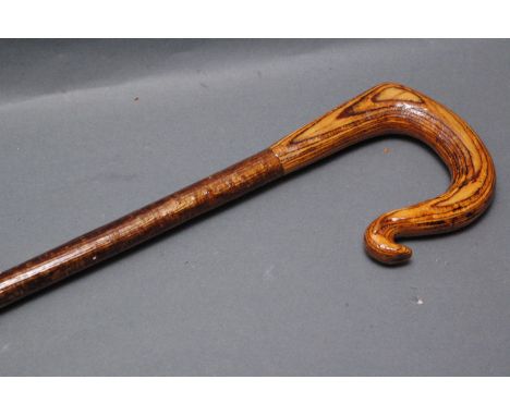 Hazel shaft walking stick with laminated crook handle.  Length 130 cm. 