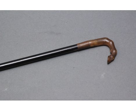 Early 20th century horn or composition handled walking stick, handle in the form of a hoof .  Length 81.5 cm. 