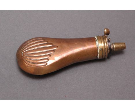 Copper and brass pistol powder flask.  12.5 cm. 
