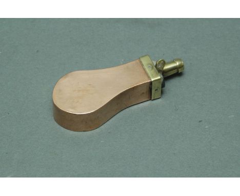 Pistol powder flask, brass and copper, plain form.  Length 9 cm. 