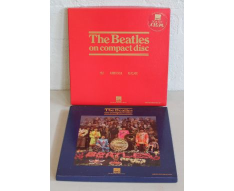 CD BOX SETS - 2 limited edition HMV 'The Beatles on Compact Disc' box sets to include 'Help, Rubber Soul, Revolver' and 'St P