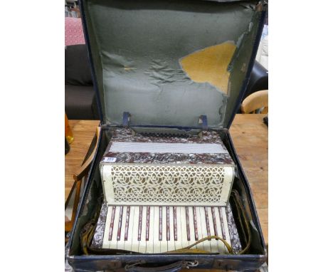 An Italian accordion by Paolo Antonio in a marble effect case 