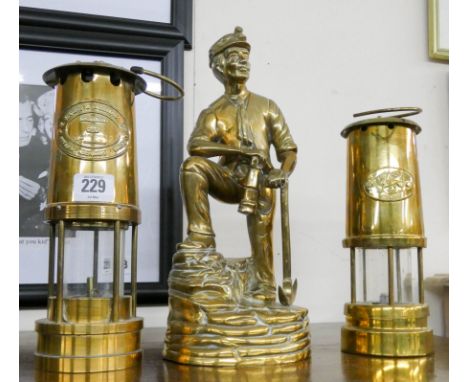 Cambrian brass miners lamp, Welsh miners lamp and a brass model of a miner 