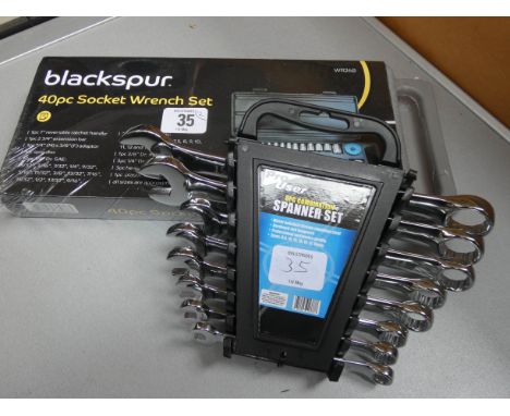 A new 40 piece socket wrench set and a new 8 piece combination spanner set 
