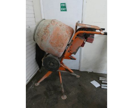 A Belle mini 140 petrol engine cement mixer 