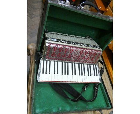 An Italian accordion in carrying case, the accordion is made by Frontalini 