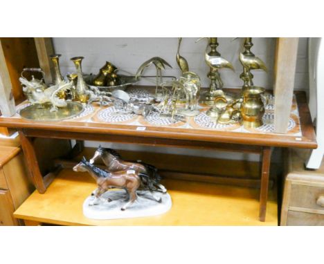 A long teak coffee table with tile top 