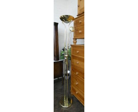A brass finished up lighter lamp standard with reading lamp 