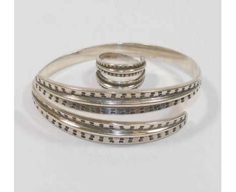 A Norwegian David Andersen silver Viking bracelet and ring from the 1960's Saga series, the interior of the ring inscribed 'C