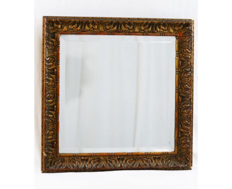 A small square bevelled edge wall mirror housed in an acanthus leaf moulded and frame with beaded edge, 26cm x 26cm
