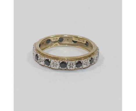 A 9 carat gold bi-colour sapphire and diamond eternity ring, the 13 round mixed cut sapphires interspersed by illusion set me