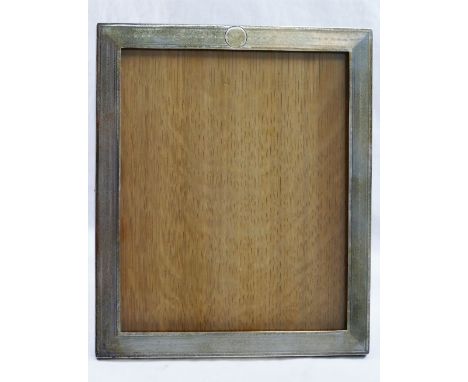 A rectangular silver photograph frame with engine turned decoration, Birmingham 1922, with oak easel back, 24.3cm x 20.5cm CO