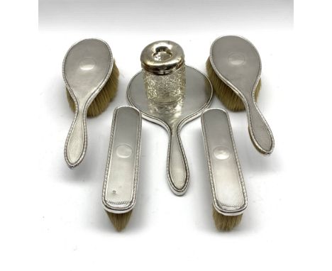 Engine turned silver five piece dressing table set Chester and Birmingham assay and a glass and silver hair tidy - Condition 