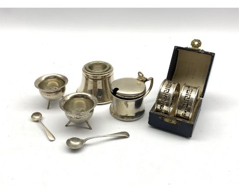 Pair of pierced silver serviette rings with key pattern decoration Birmingham 1929, boxed, circular silver mustard pot Birmin
