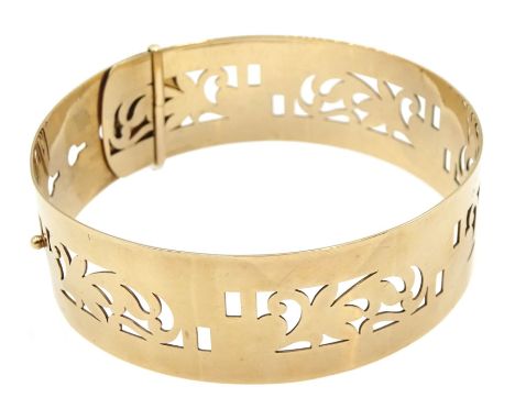 Gold hinged bangle with openwork decoration stamped 9ct, approx 19.78gm - Condition Report Good condition