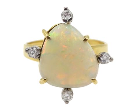 Gold opal and four stone diamond ring, stamped 18ct - Condition Report Approx 4.6gm, size P, overall head size = 20mm x 18mm 