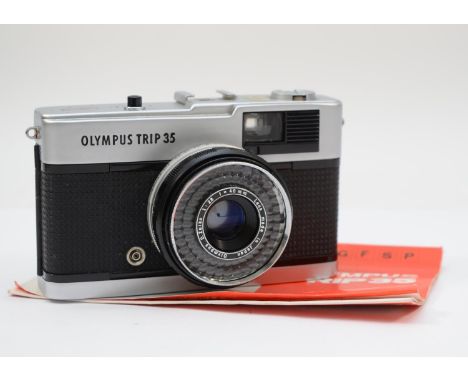 A Olympus Trip 35 film camera, with manual, working 