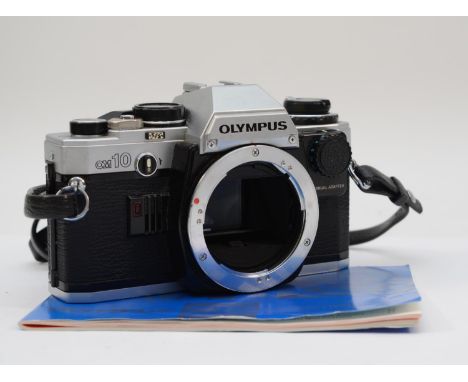 A Olympus OM10 35mm film camera, body only, with manual, working 