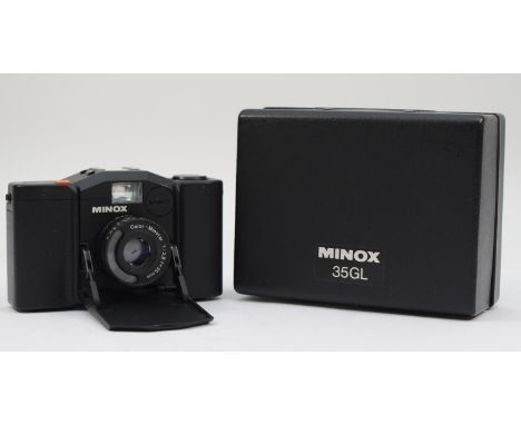 A Minox 35 GL 35mm film camera, with original box and owner's manual 