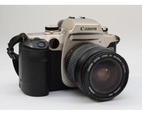 A Canon EOS Elan II 35mm film camera, together with a Canon 28mm-80-- f3.5-f5.6 lens, working 