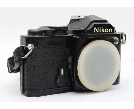 A Nikon FM 35mm film camera, body only, in all black colourway, with manual, working 