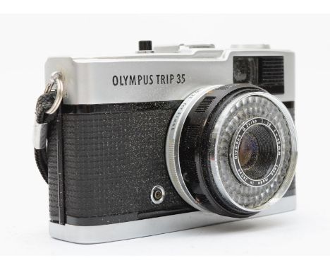 A Olympus Trip 35 35mm film camera, with manual and soft carry case, working 