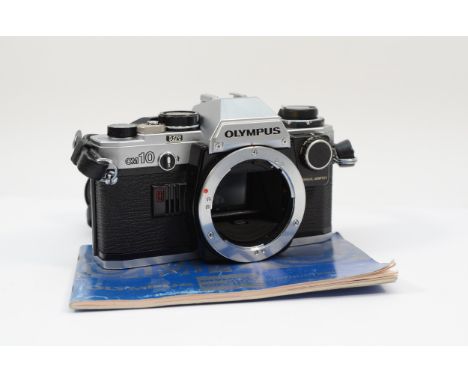 A Olympus OM10 35mm film camera, body only, with manual, working 