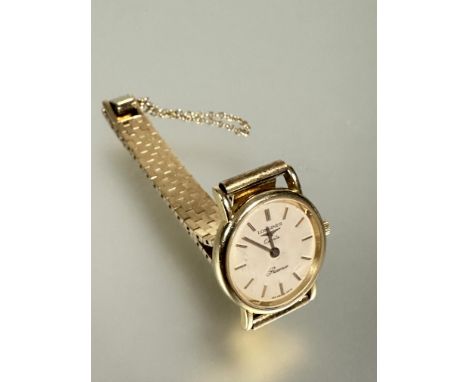 A Longines 9ct gold Presence ladys quartz wrist watch with champagne enamel dial and baton hour markers on 9ct flexible link 