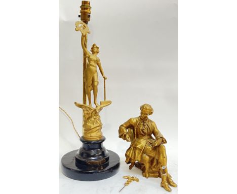 A spelter lamp base modelled as a female figure with hammer atop an eagle marked 'L'Industrie' (h- 48cm), together with anoth